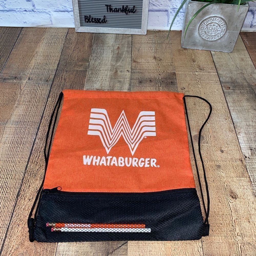 Drawstring Whataburger backpack with pencils